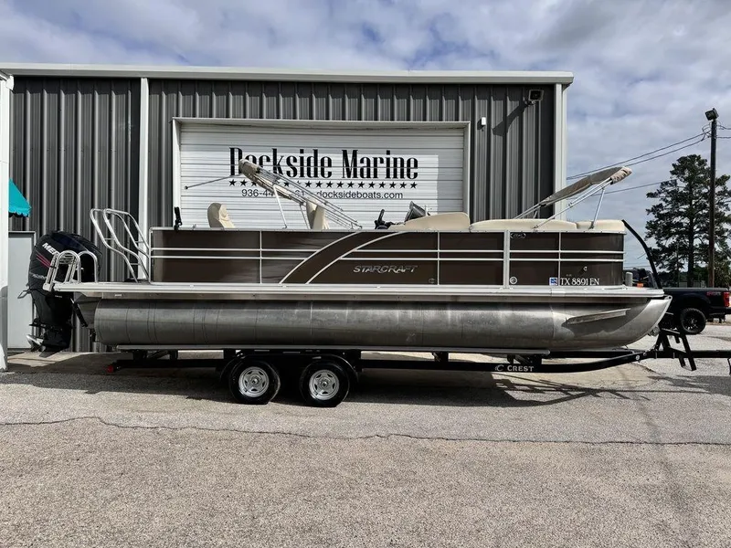 Slide: The Image of 2018 Starcraft 23 FD pontoon boat on trailer at Dockside Marine. - 0