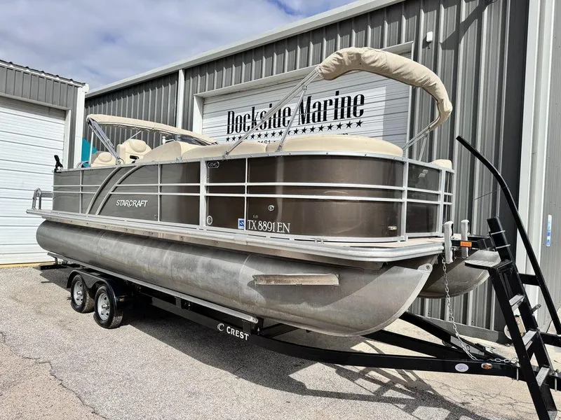 Slide: The Image of 2018 Starcraft 23 FD pontoon boat on trailer at Dockside Marine. - 1