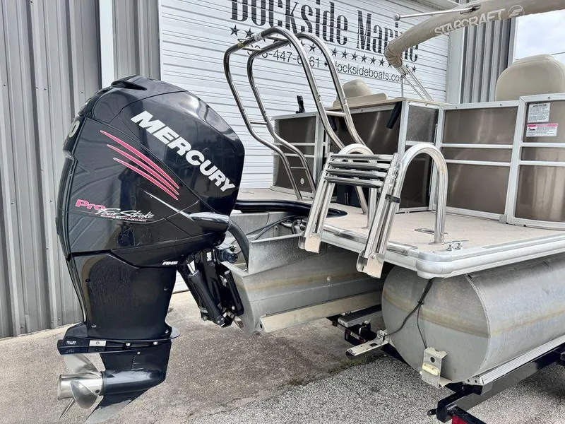 Slide: The Image of 2018 Starcraft 23 FD pontoon boat with Mercury Pro FourStroke outboard motor. - 2