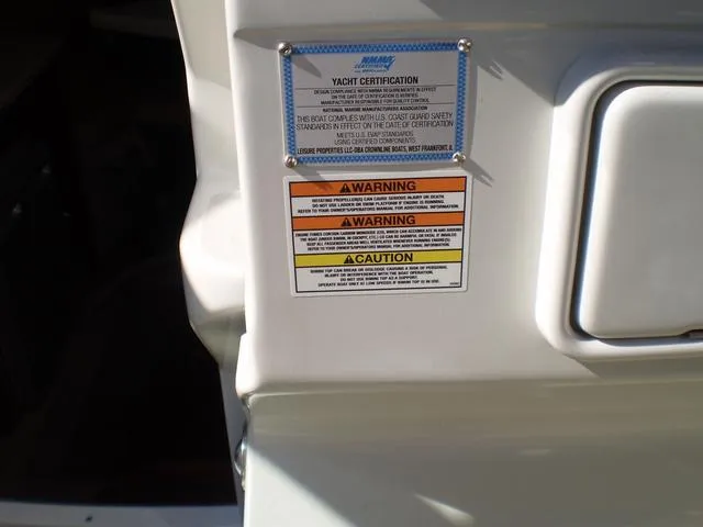 Slide: The Image of Warning labels on a 2021 Crownline 264 CR yacht. - 10