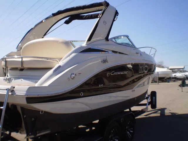 Slide: The Image of 2021 Crownline 264 CR boat on trailer, side view. - 3