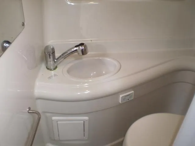 Slide: The Image of 2021 Crownline 264 CR boat bathroom sink and faucet. - 39
