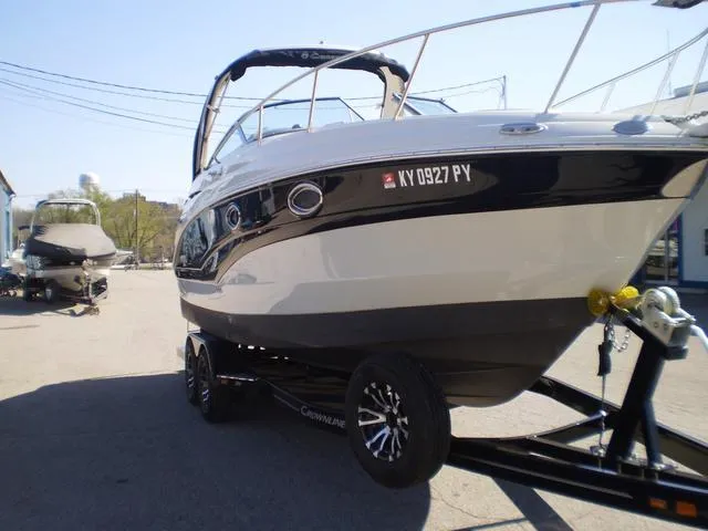 Slide: The Image of 2021 Crownline 264 CR boat on trailer, side view. - 4
