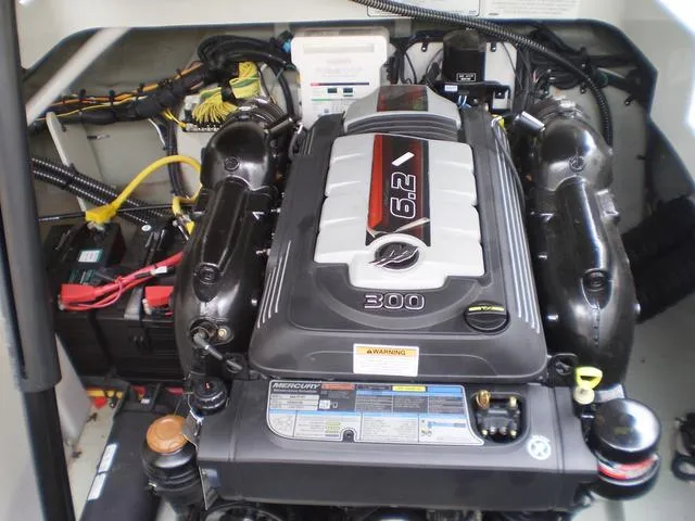 Slide: The Image of 2021 Crownline 264 CR boat engine compartment with 6.2L 300 HP MerCruiser engine. - 41