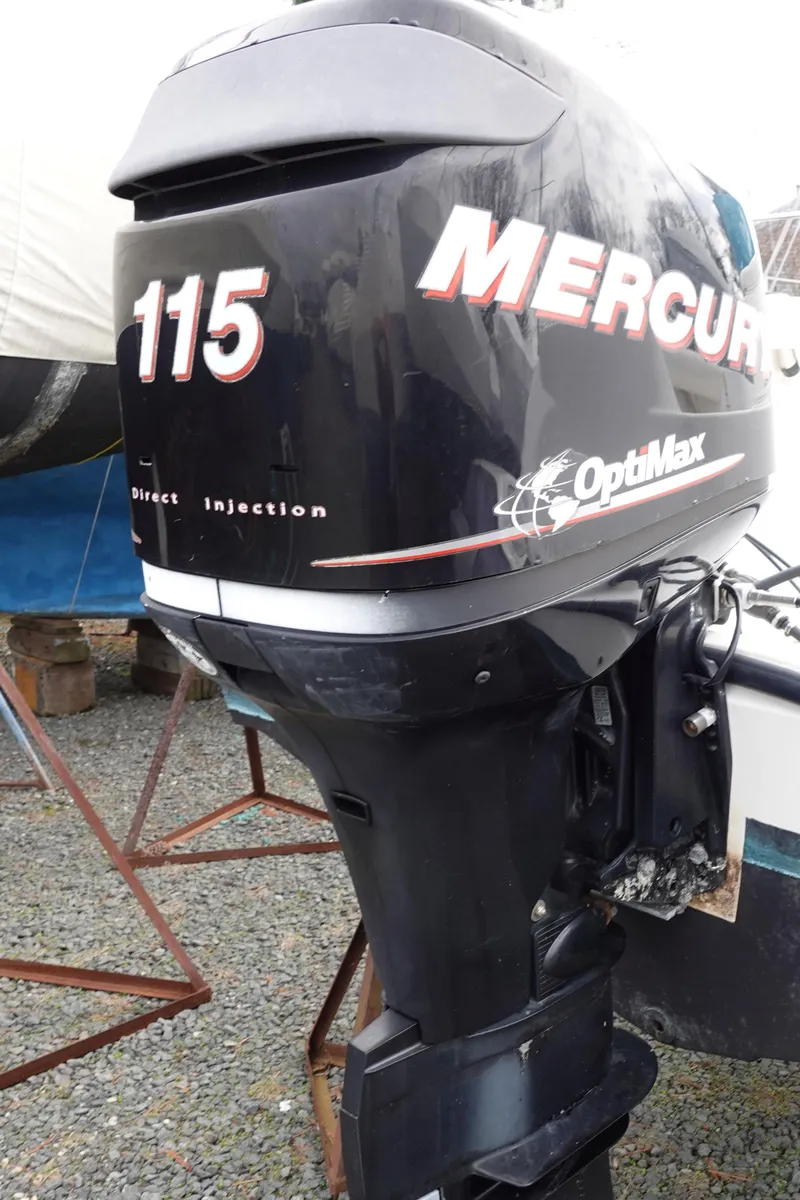 Slide: The Image of Mercury OptiMax 115 outboard motor on 2008 Trophy 1903 Center Console boat. - 13
