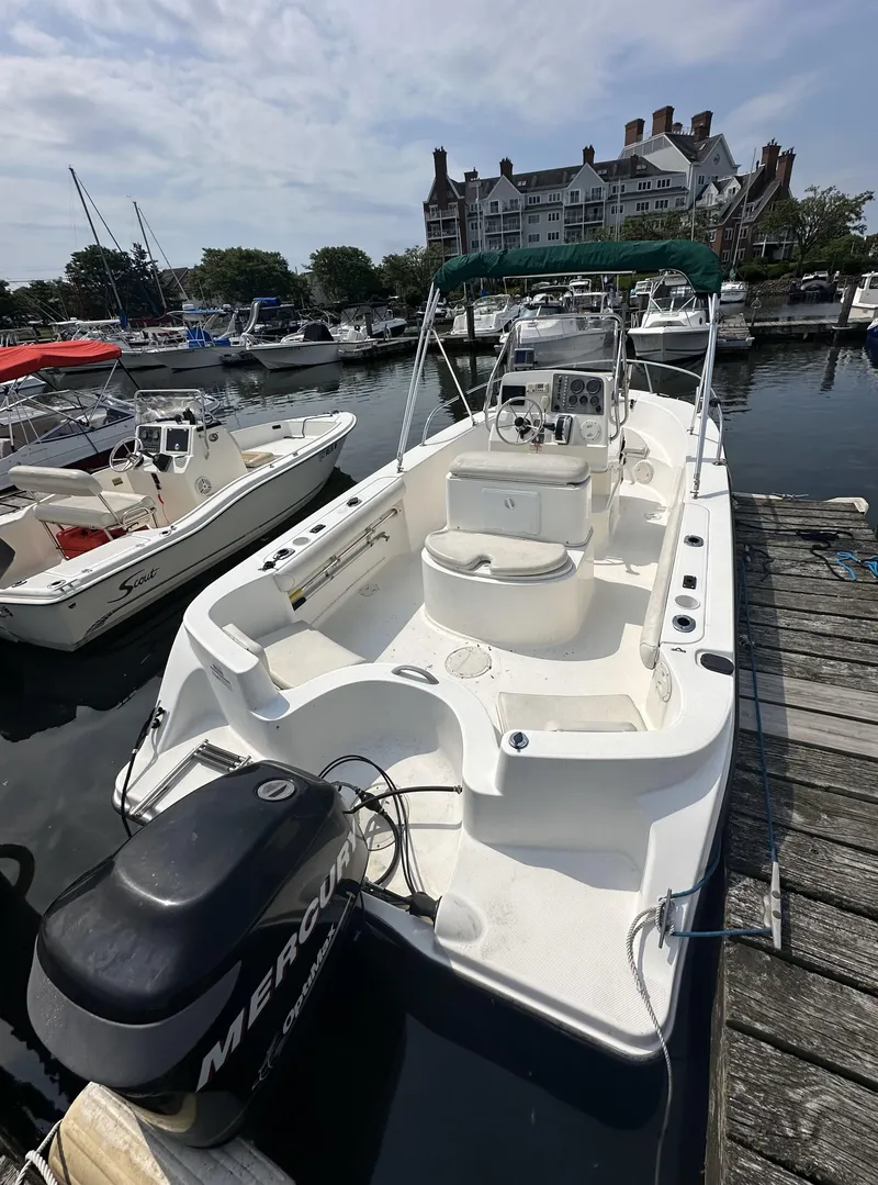 Slide: The Image of 2008 Trophy 1903 Center Console boat docked at marina with Mercury engine. - 3