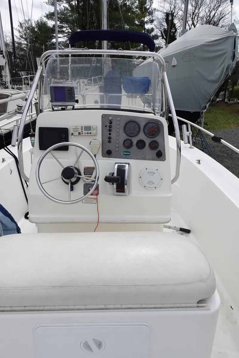 Slide: The Image of 2008 Trophy 1903 Center Console boat with steering wheel and control panel. - 7
