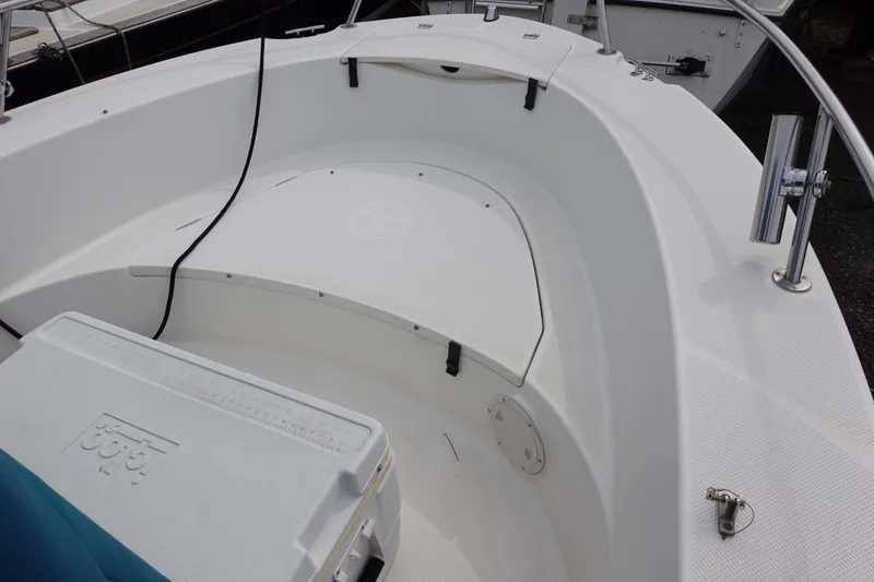 Slide: The Image of 2008 Trophy 1903 Center Console boat interior with seating and storage. - 9