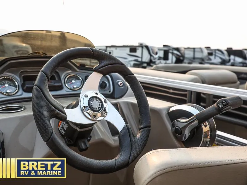 Slide: The Image of Steering wheel of 2022 Tracker 22 XP3 Party Barge at Bretz RV & Marine. - 13