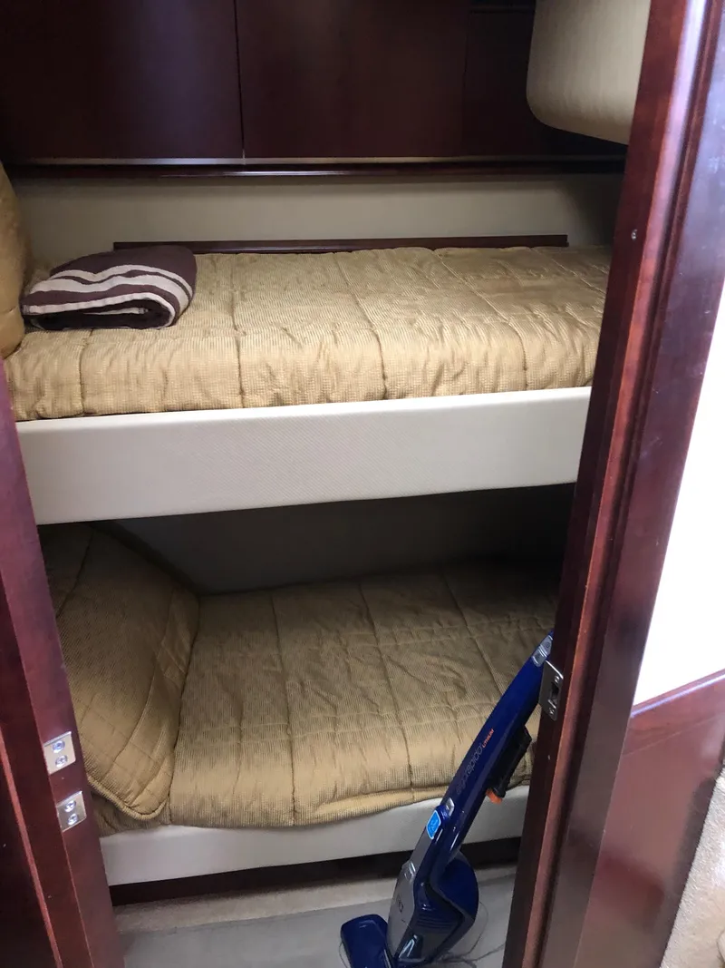 Slide: The Image of Bunk beds in the 2006 Sea Ray 52 Sedan Bridge cabin. - 33