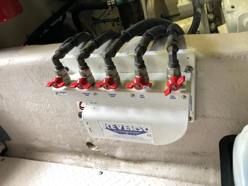 Slide: The Image of Reverso oil change system in a 2006 Sea Ray 52 Sedan Bridge engine room. - 41