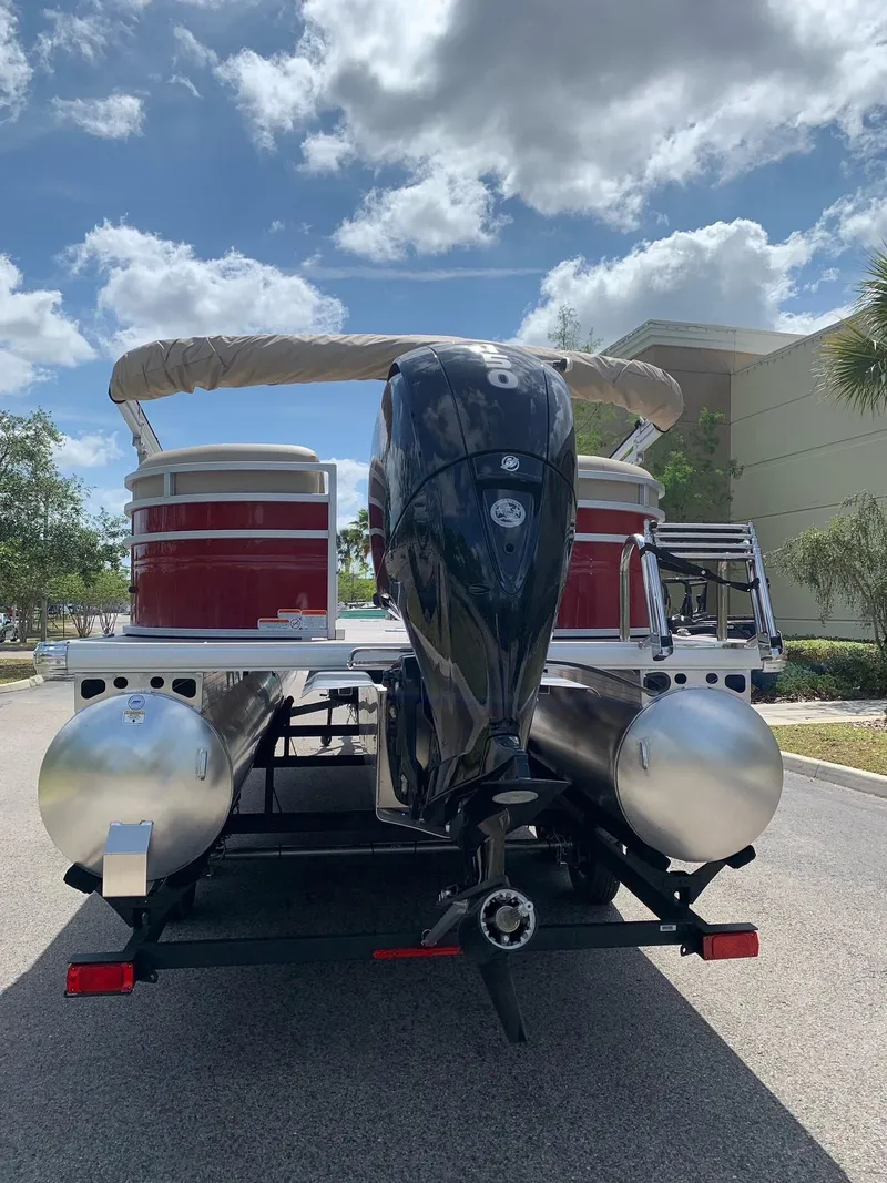 Slide: The Image of 2024 Sun Tracker Party Barge 24 DLX pontoon boat with outboard motor. - 3