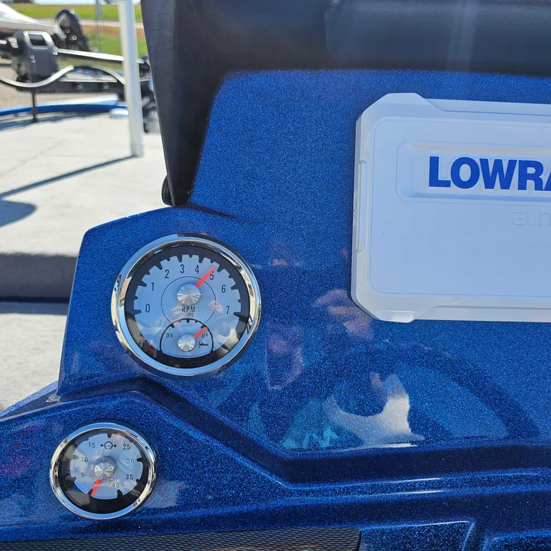 Slide: The Image of Close-up of 2024 Nitro Z18 Pro boat dashboard with gauges and Lowrance display. - 17