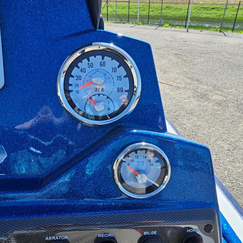 Slide: The Image of Close-up of 2024 Nitro Z18 Pro boat dashboard with speedometer and fuel gauge. - 19