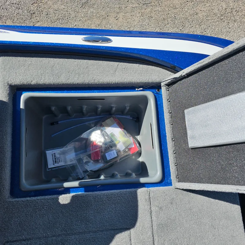 Slide: The Image of 2024 Nitro Z18 Pro storage compartment with accessories inside. - 23