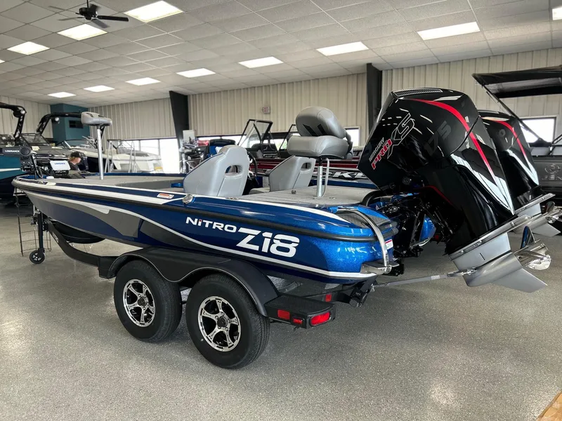 Slide: The Image of 2024 Nitro Z18 Pro boat with powerful engine in showroom. - 4