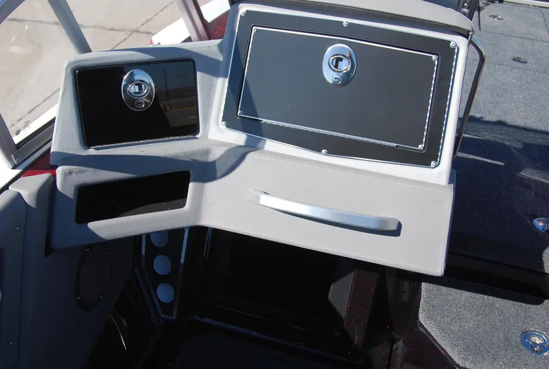 Slide: The Image of 2024 Ranger 620FS Pro boat dashboard with storage compartments. - 12