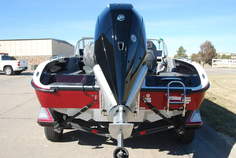 Slide: The Image of 2024 Ranger 620FS Pro boat with powerful outboard motor, rear view. - 4