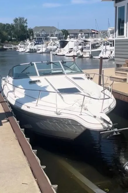 The Image of 1992 Sea Ray 280 Weekender docked at a marina. - 1