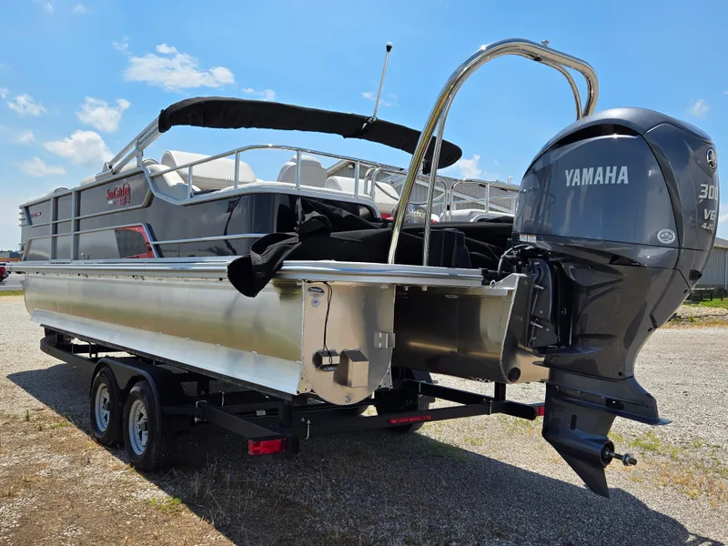 Slide: The Image of 2024 SunCatcher Elite 326 SS pontoon boat with Yamaha 300 V6 engine on trailer. - 5
