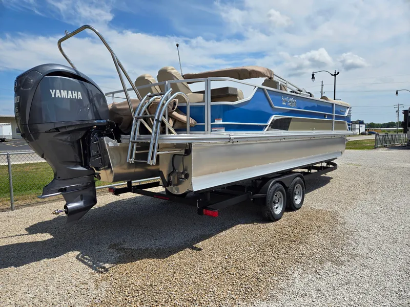 Slide: The Image of 2024 SunCatcher Elite 326 SE pontoon boat with Yamaha motor on trailer. - 3