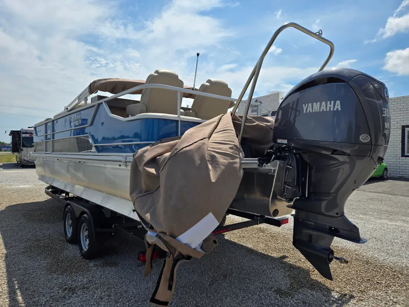 Slide: The Image of 2024 SunCatcher Elite 326 SE pontoon boat with Yamaha motor on trailer. - 5