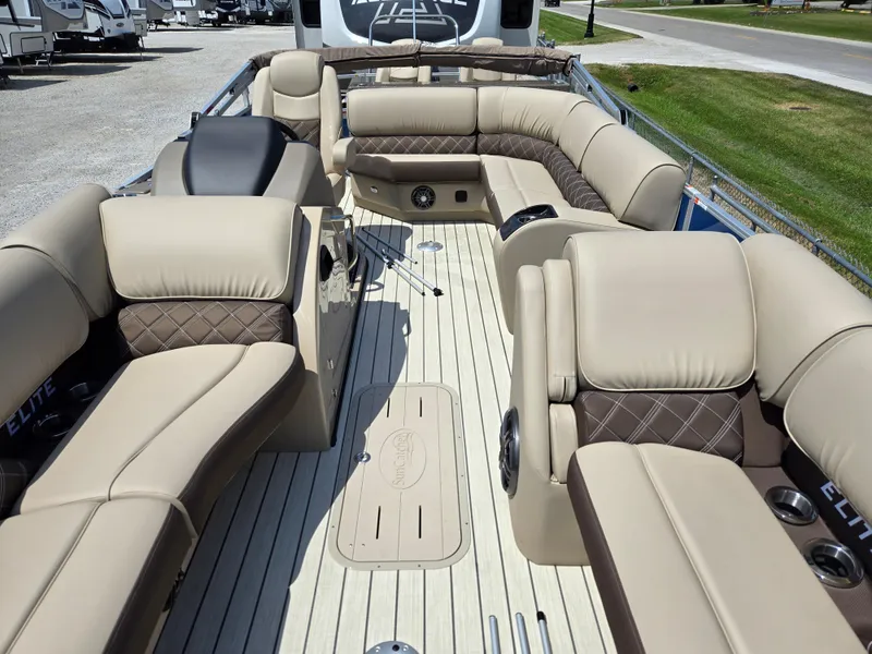 Slide: The Image of 2024 SunCatcher Elite 326 SE pontoon boat with luxurious seating and spacious deck. - 7