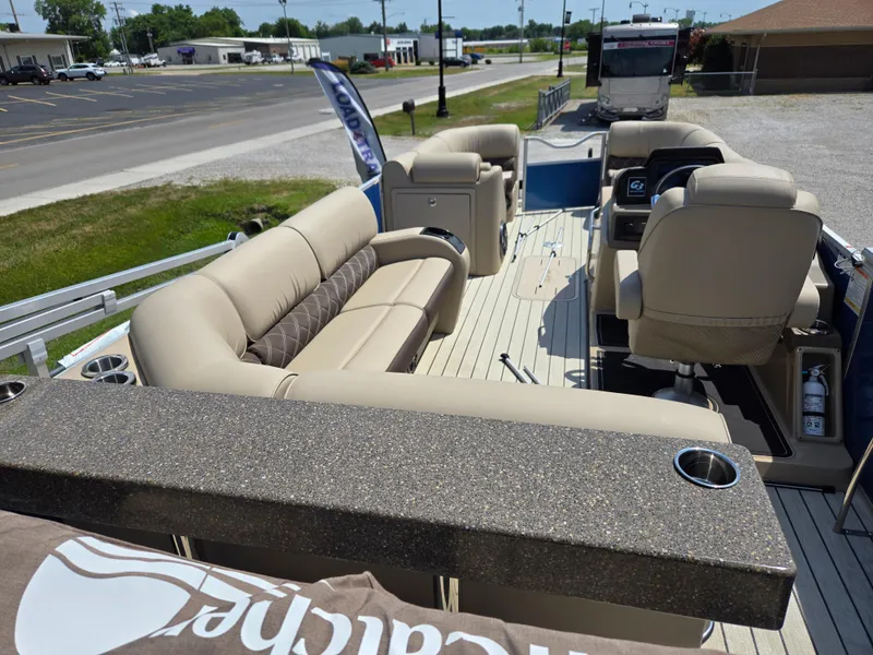 Slide: The Image of 2024 SunCatcher Elite 326 SE pontoon boat with luxurious seating and modern design. - 8