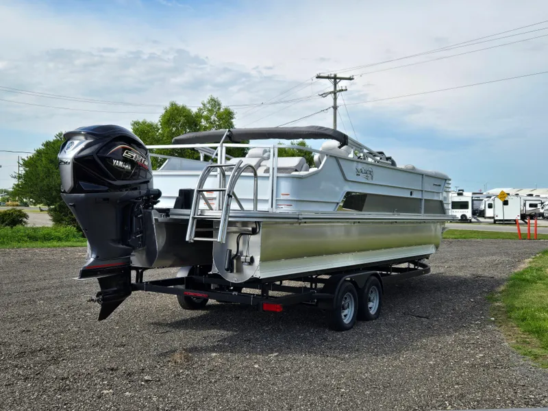 Slide: The Image of 2024 SunCatcher Elite 326 SL pontoon boat with Yamaha engine on trailer. - 3