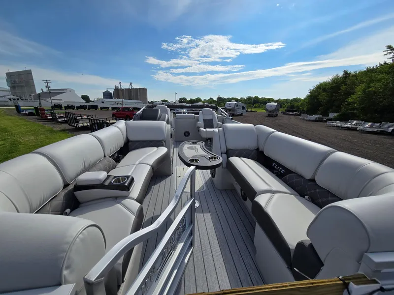 Slide: The Image of 2024 SunCatcher Elite 326 SL pontoon boat with spacious seating and modern design. - 9