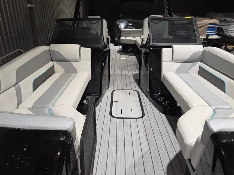 Slide: The Image of 2024 SunCatcher Amara boat interior with sleek seating and modern design. - 7