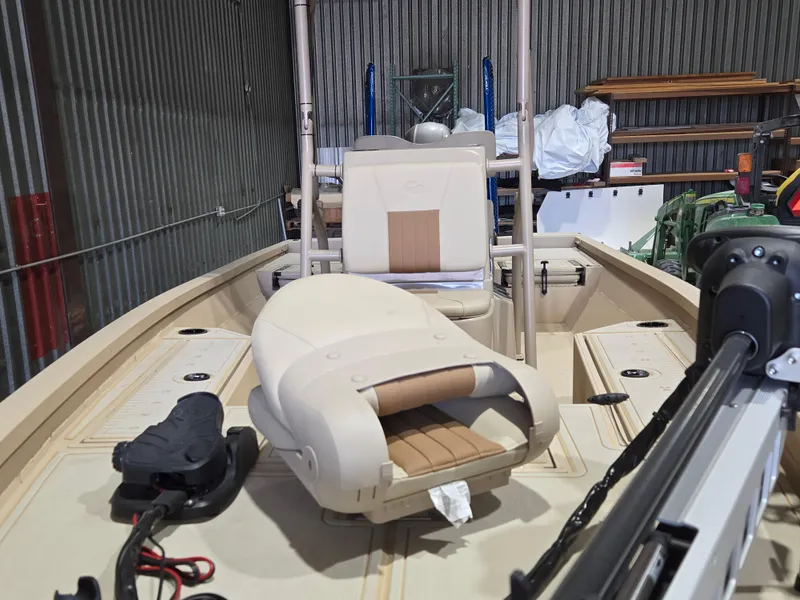 Slide: The Image of 2023 G3 Bay 20 GX boat interior with seating and equipment in a storage area. - 7