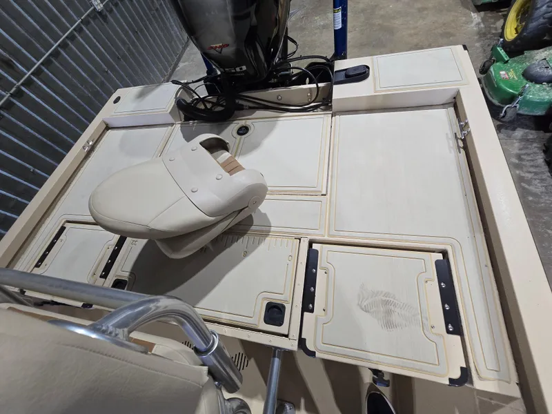 Slide: The Image of 2023 G3 Bay 20 GX boat interior with seating and storage compartments. - 9