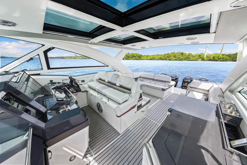 Slide: The Image of 2017 Formula 430 Super Sport Crossover yacht interior with luxurious seating and modern design. - 37