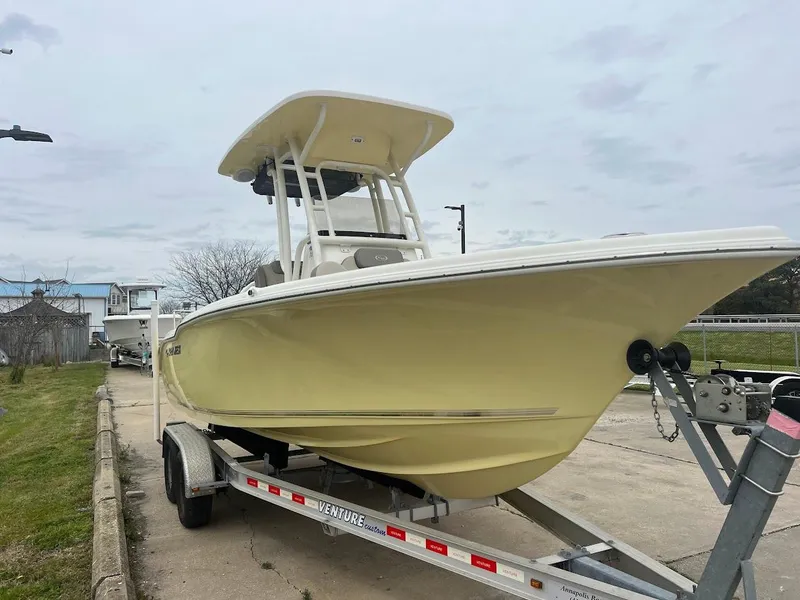 Slide: The Image of 2024 Key West 219 FS boat on a trailer, side view. - 3