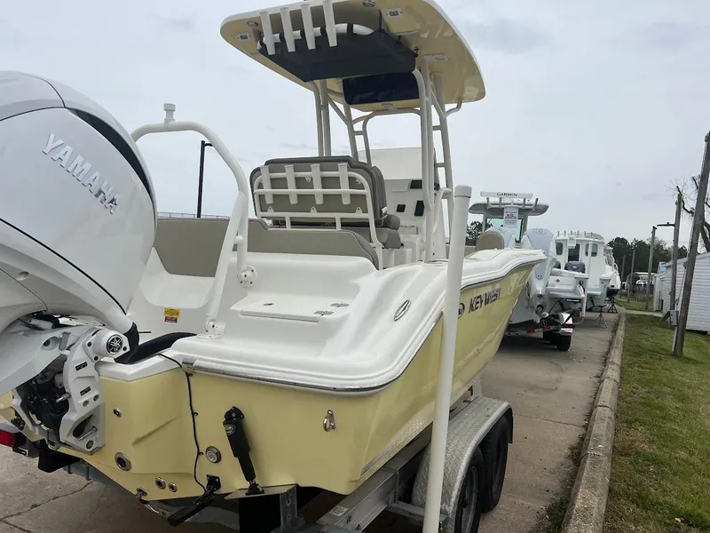 Slide: The Image of 2024 Key West 219 FS boat with Yamaha engine on trailer. - 4