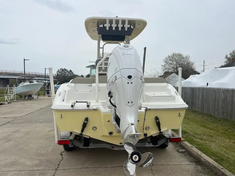 Slide: The Image of 2024 Key West 219 FS boat with outboard motor, rear view. - 5