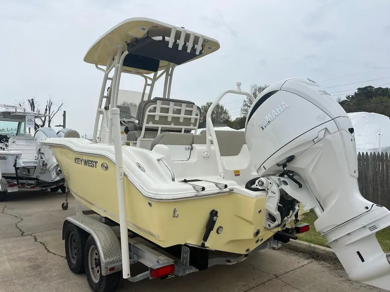 Slide: The Image of 2024 Key West 219 FS boat on trailer with Yamaha outboard motor. - 6