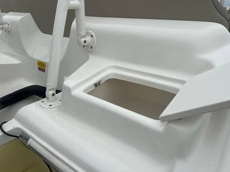 Slide: The Image of 2024 Key West 219 FS boat storage compartment. - 7