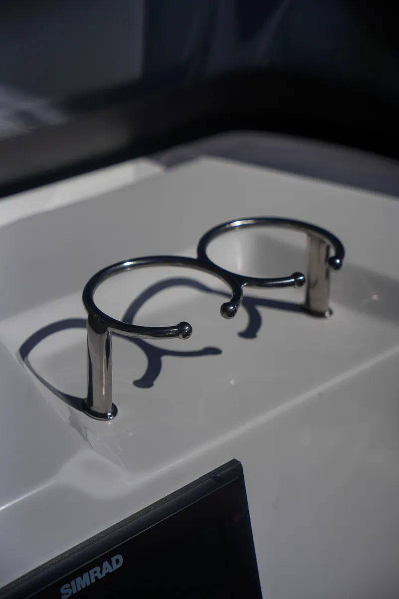 Slide: The Image of Stainless steel cup holders on Sea Prop COMFORT 24 boat, 2025 model. - 12