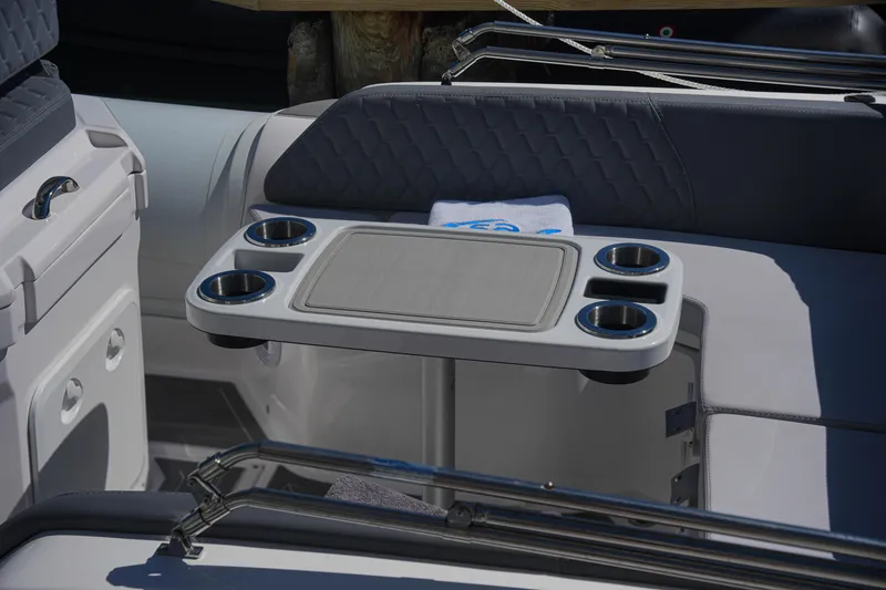Slide: The Image of 2025 Sea Prop COMFORT 24 boat interior with table and cup holders - 6