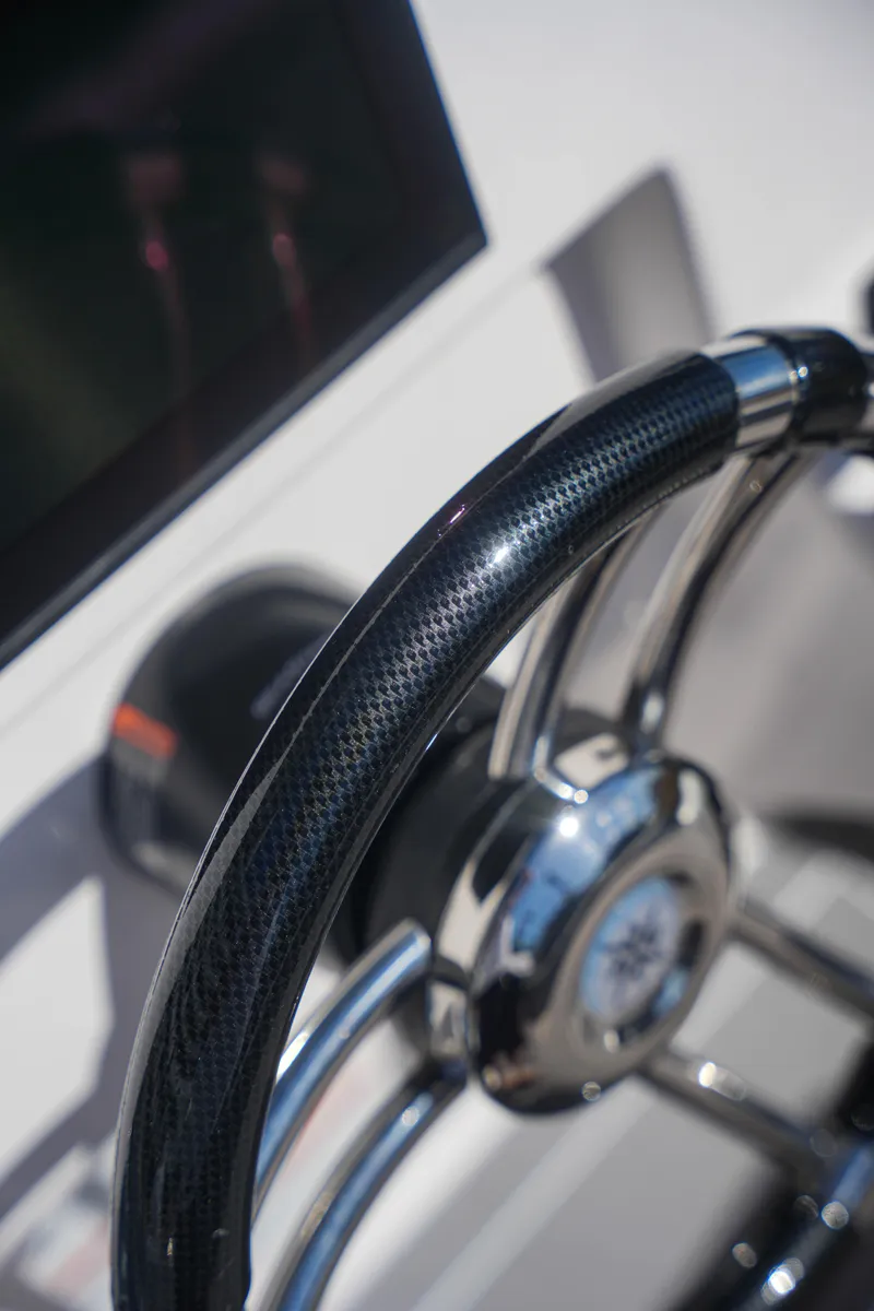 Slide: The Image of Close-up of the steering wheel of a 2025 Sea Prop COMFORT 24 boat. - 9