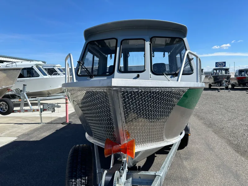 Slide: The Image of 2024 Hewescraft 190 Searunner HT FC boat on trailer, front view. - 2