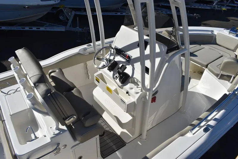 Slide: The Image of 2024 Key West 239 FS boat interior with helm station and seating. - 12