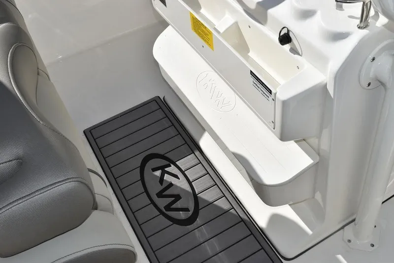 Slide: The Image of 2024 Key West 239 FS boat interior with KW logo mat and seating. - 33