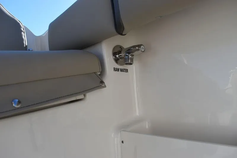 Slide: The Image of 2024 Key West 239 FS boat raw water faucet and seating detail. - 36