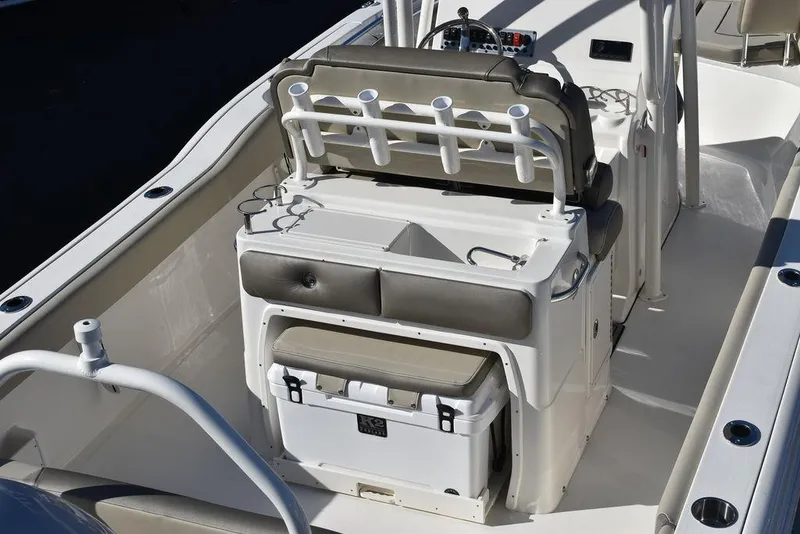 Slide: The Image of 2024 Key West 239 FS boat interior with seating and storage. - 9
