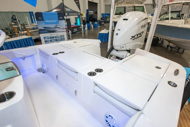 Slide: The Image of 2025 Regulator 26XO boat interior with Yamaha XTO engine at a boat show. - 5
