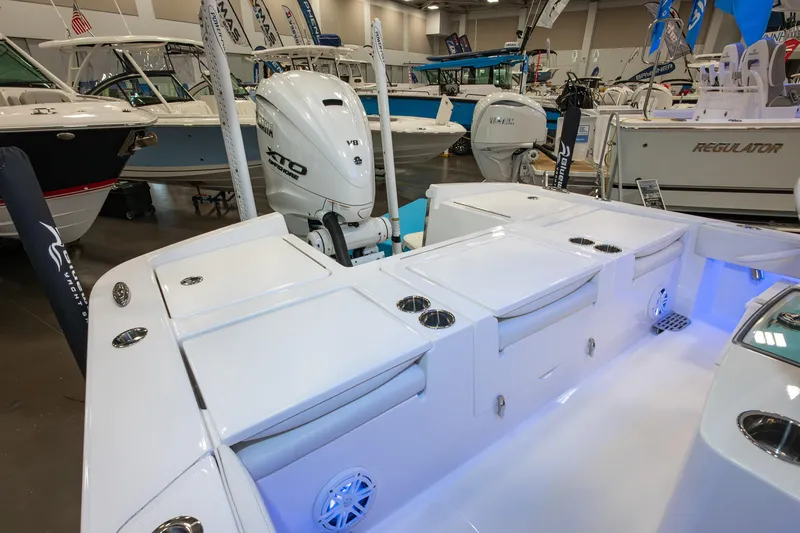 Slide: The Image of 2025 Regulator 26XO boat interior with Yamaha XTO engine at a boat show. - 6