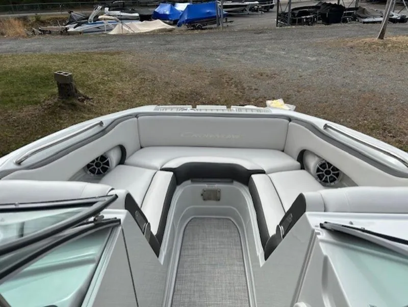 Slide: The Image of 2024 Crownline E Series E235 boat interior with spacious seating and modern design. - 3